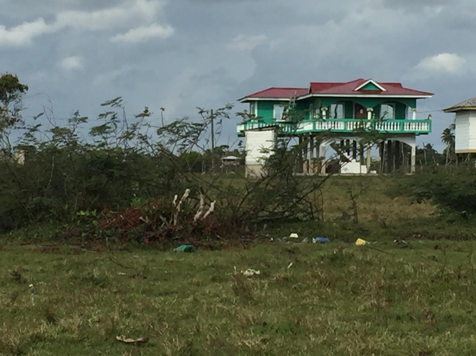 Photo taken of a home in Nicaragua next to a field