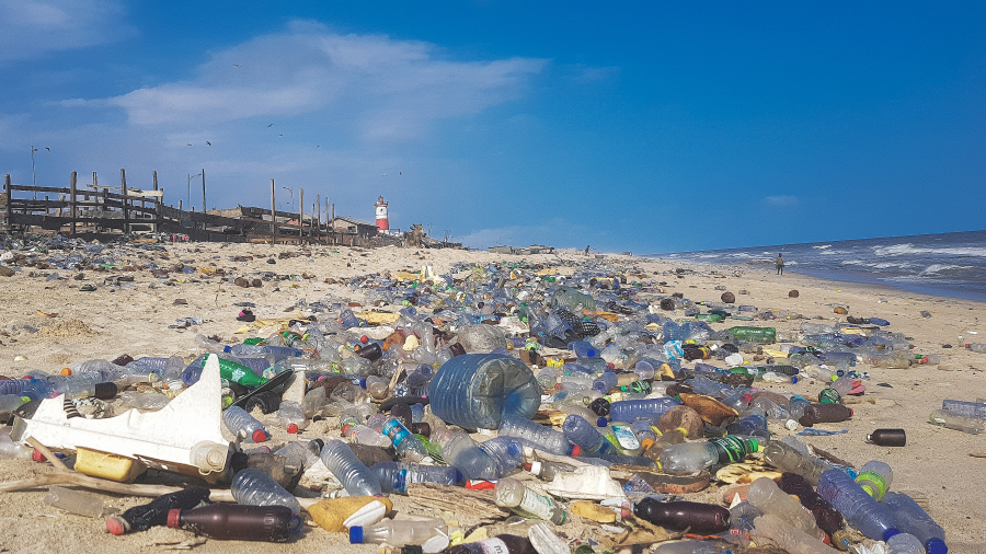 Plastic debris covering a beach 