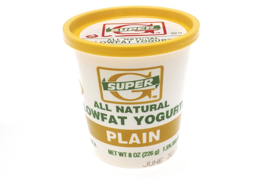 A yellow plastic yogurt container