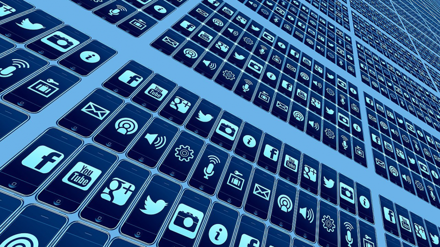 An image showing a repeating pattern of social media apps on a blue background