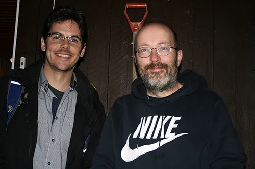 Researchers Neil Carter and John Linnell standing side by side